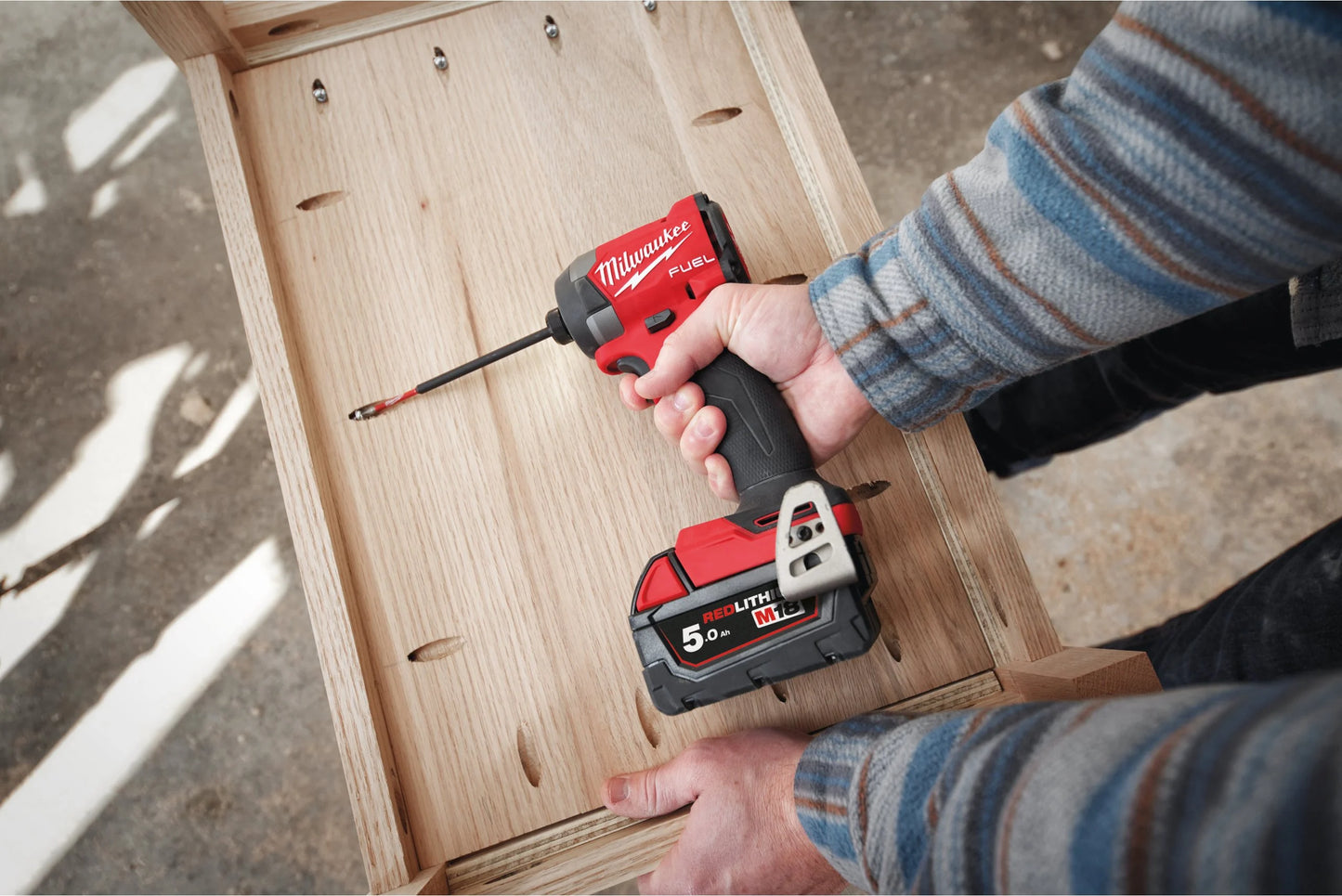 Milwaukee M18 FID3-502X Schlagschrauber M18 Fuel ¼″ Sechskant + 2 Akkus 5 Ah + Ladegerät + Koffer