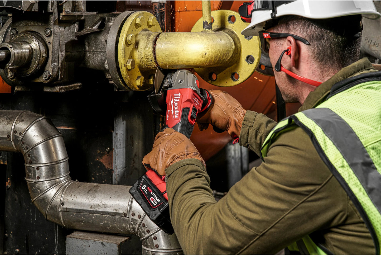 Amoladora angular M18 125mm con freno e interruptor de botón + 2bat 5Ah + Cargador + Maltín Milwaukee M18 FSAG125XB-502X